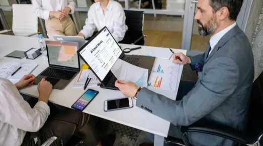 Advisors discussing intelligent inbox workflows
